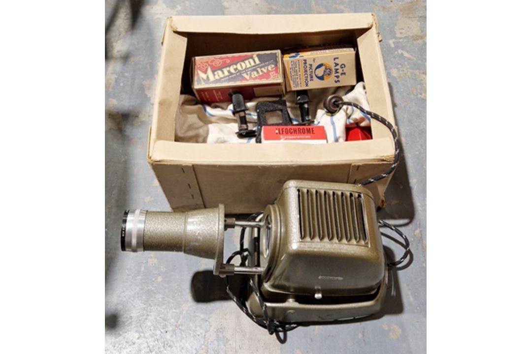 Aldis projector and accessories to include lamp bulbs, etc