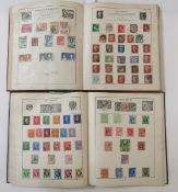 World stamps: Four small albums of mint and used issues; definitives, commemoratives, air,