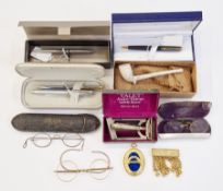 Waterman ballpoint pen in matt black case, boxed, a Parker fountain pen, a Sheaffer stainless