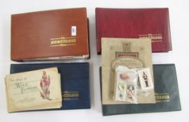 Cigarette and tea cards in four albums to include Brooke Bond Tea, John Player & Sons Characters