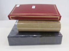 Three albums of postcards, early 20th century and later, including scenes of topographical