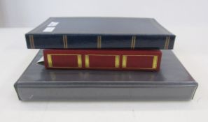 Three albums of early 20th century and later postcards to include mixed topographical, transport and