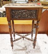 Late 19th/early 20th century oak box on stand, with foliate scroll hinged lid and frieze panels,