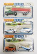 Three carded Matchbox 900 diecast lorry sets including TP-5 no.9 Ford Escort 'Phantom' and boat on