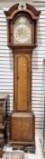 19th century oak cased eight-day longcase clock by William Jackson of Thirsk, the brass face with