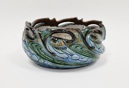 C H Brannam (Barum) Art Pottery oval jardiniere, moulded with spiralling waves and fronds in blue