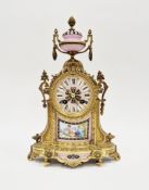 Late 19th century gilt ormolu French cased mantel clock with Sevres-style porcelain plaques, the