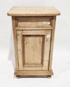 Victorian pine bedside cabinet/pot cupboard with single drawer over single panel door, raised on