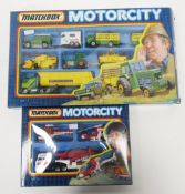 Two boxed Matchbox 'Motorcity' diecast vehicle gift sets including MC7 ( MC-7 ) 5 farm vehicles