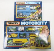 Two boxed Matchbox 'Motorcity' diecast vehicle gift sets including MC7 ( MC-7 ) 5 farm vehicle set