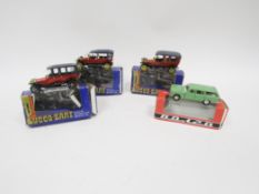 Three boxed Russobalt 1:43 scale diecast model cars together with a Volga boxed 1:43 diecast model