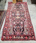 Iranian hand knotted 100% wool rug, scarab beetle tribe(?), floral in blues, reds, turquoise and