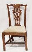 Two Georgian mahogany country dining chairs with pierced carved splats, largest 55cm wide by 93cm