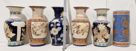 Five 20th century large Chinese-style pottery oviform vases and a cylindrical stick-stand, incised