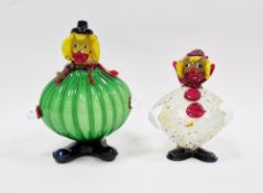 Two Murano glass figures of clowns, one with fluted globular green body, the other speckled in