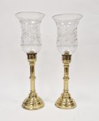 Pair of late 19th/early 20th century brass storm lanterns with acid-etched glass shades, possibly