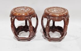 Pair of Chinese hardwood drum stools in the form of barrels, with bird and flower mother-of-pearl