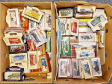 Large collection of boxed and loose diecast vehicles including four display cabinets holding loose