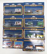 Eight carded Matchbox diecast twin packs including 2 cars and caravans, Porsche car with glider on