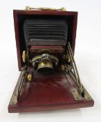 Early 20th Unicum bellow field camera, mahogany and brass bound case, marked Bausch and Lomb Co