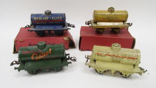 Four '0' gauge tankers including Hornby no.1 petrol tank wagon 'Redline-Glico' with box, Hornby no.1