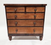 Victorian mahogany chest of two short over three long drawers, with tiger striped effect turned