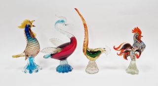 Four Murano glass models of birds, comprising: two cockerels, a cockerel/pheasant in green and amber