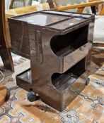 Joe Columbo (1930-1971) for Biffeplast mid century brown plastic Boby trolley with an arrangement of
