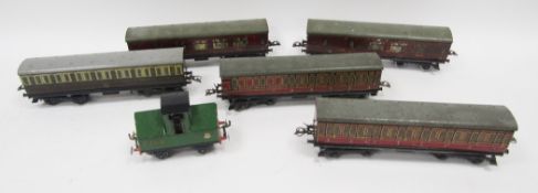 Hornby '0' gauge GWR passenger coach no.6597, three LMS passenger coaches, Meccano LMS passenger