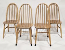 Set of four mid century beech wood hoop and stick back dining chairs in the style of Ercol Quaker,