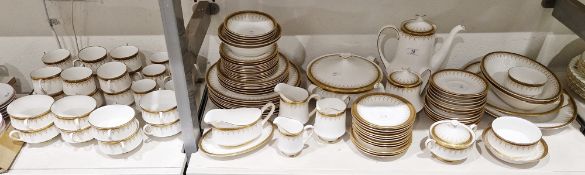 Extensive Paragon china dinner, tea and coffee service, Athena pattern, formal gilt borders, to