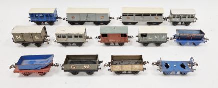 Collection of thirteen Hornby 0 gauge items of rolling stock including brake vans, cattle wagons,