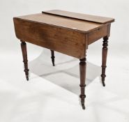 19th century mahogany pembroke table with drawer to one end and raised on turned supports