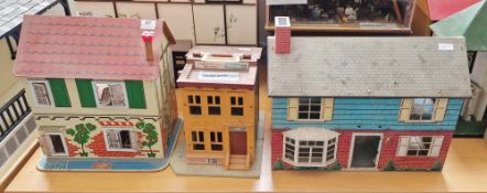 Three doll's houses including GB Toys 'Mihome' wooden doll's house, Fisher-Price Sesame Street