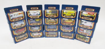 Twenty boxed Matchbox diecast vehicles including MB-27 tractor, MB-71 GMC wrecker, 2 x MB-59 Porsche