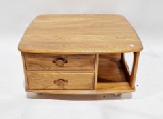 Ercol light elm Pandora's Box square coffee table with an arrangement of two drawers and three