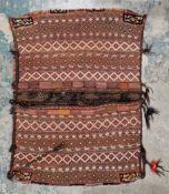 Large unusual saddle bag, Afghanistan hand made, inlaid with very old pieces of rug antique, 124cm x
