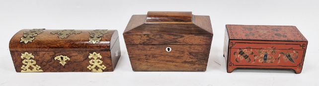 Early 19th century rosewood tea caddy of sarcophagus form, the hinged lid opening to two lidded