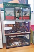 Scratch-built doll's house shop in the form of an ironmongers fitted with furniture including a shop