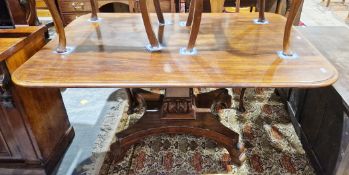 Early to mid Victorian mahogany rectangular tilt-top breakfast table raised on a square column