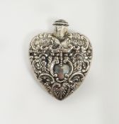 Continental silver scent bottle in the form of a heart with embossed decoration, having British