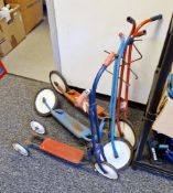 Three mid century Tri-ang tubular metal scooters including red, blue and dark blue