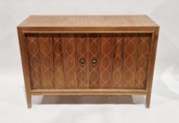 Mid century retro 1960's Gordon Russell ' Helix ' walnut sideboard, the double doors opening to a