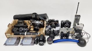 Collection of cameras and accessories including an Asahi Pentax Spotmatic camera, a Praktica