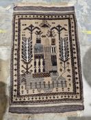 Afghan rug with brown, blue and beige garden design protecting the walls of the garden, 100% wool,