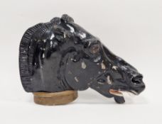 Reconstituted stone wall hanging flat back model of a Greek black horse's head, with banter neck
