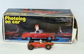 Carrera universal red Ferrari Tipo 156 slot car, circa 1960's together with boxed tinplate 'Photoing