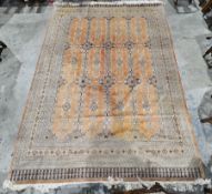 Kashmir (Shehraz) apricot ground lambs wool & silk carpet, with two rows of three connected