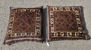 Pair of hand knotted hand made cushions from Afghanistan in blue, cream and brown, interesting