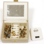Small quantity of costume jewellery to include various earrings etc. in cream leather jewellery